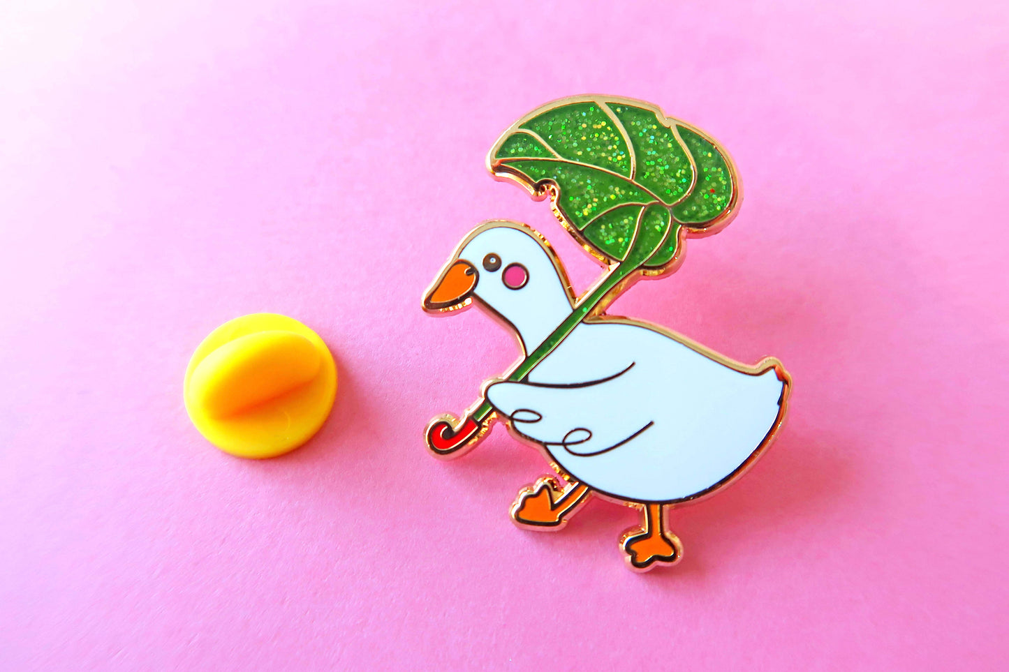 Duck with Glitter Leaf Umbrella Enamel Pin