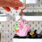 Strawberry Skunk Acrylic Keyring